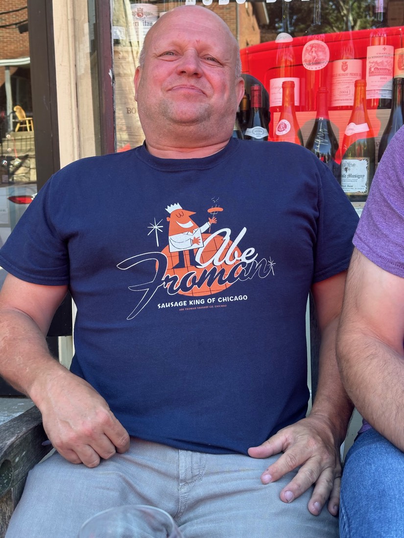 Gerry in an Abe Froman t-shirt outside the shop