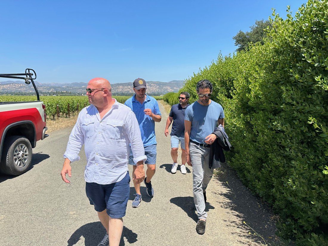 Gerry and friends walking a Napa vineyard
